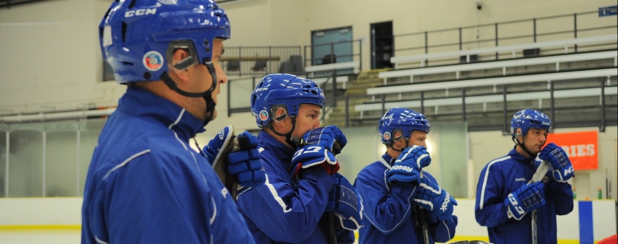 Hockey Alberta Coaches In A Line