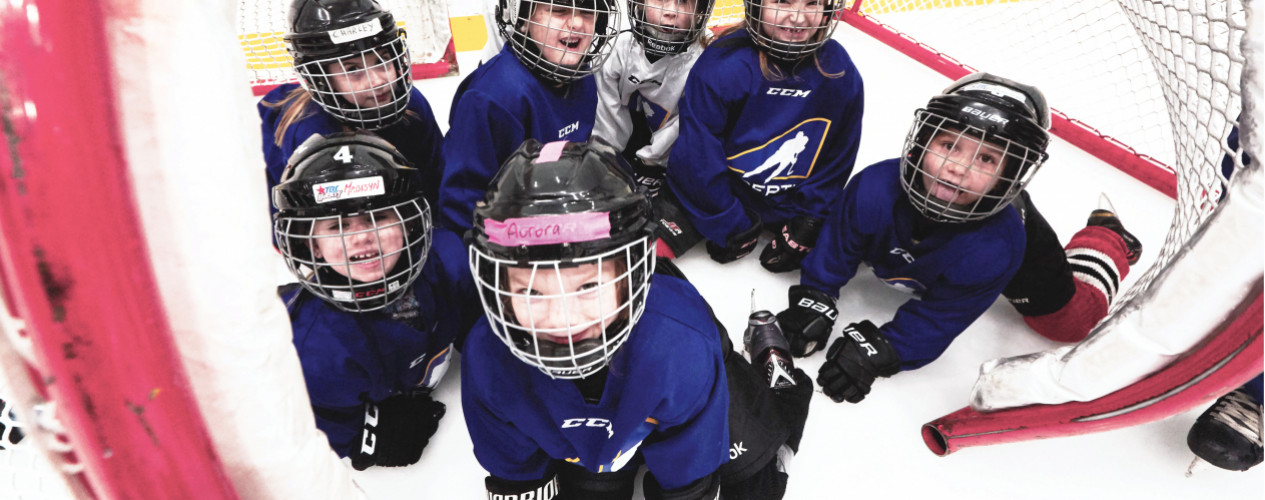 Kids In Hockey Net