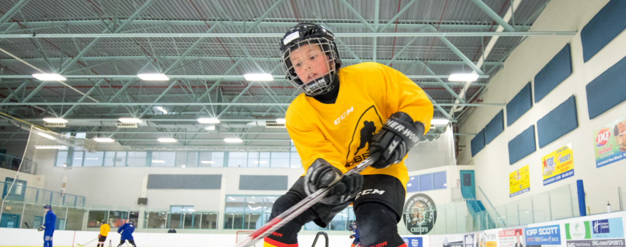 Child Playing Hockey