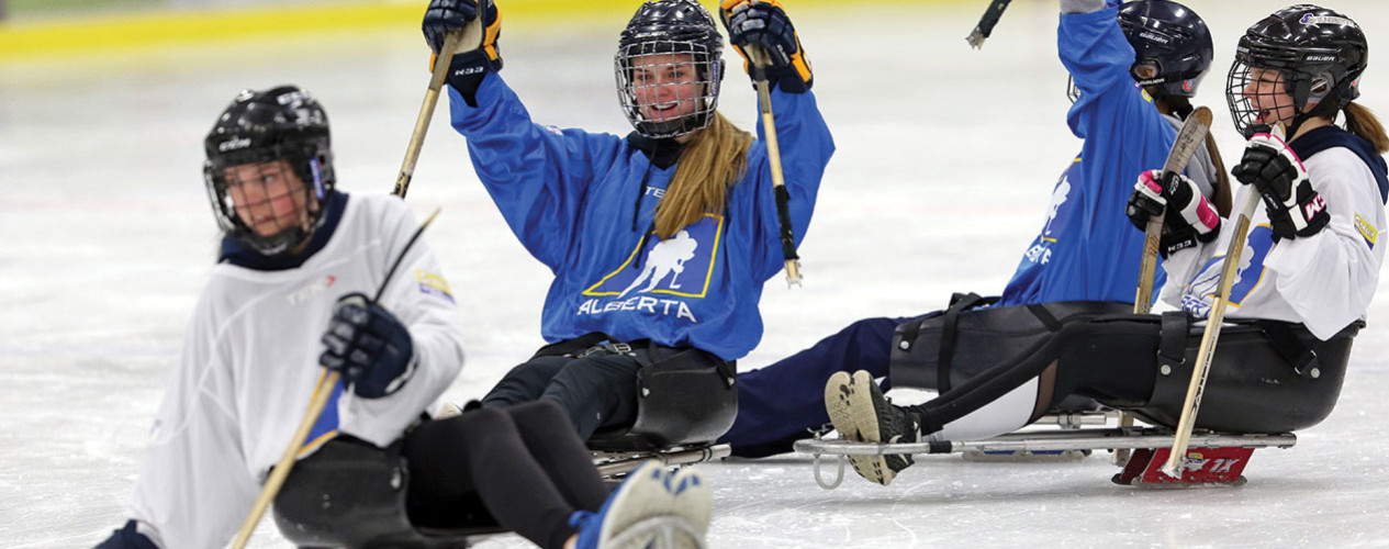 Kids Playing Sledge Hockey