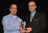 Curtis Nichols (left) accepts the 2016 Chair of the Board Award from Board Chair Terry Engen.