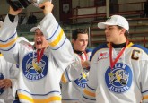 Team Alberta alumni Sam Steel (centre) and Kale Clague (right) celebrate Team Alberta’s 2013 Western Canada U16 Challenge Cup win. (Photo credit: LA Media)