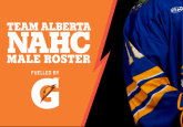 Image: Team Alberta hockey player holding hockey stick