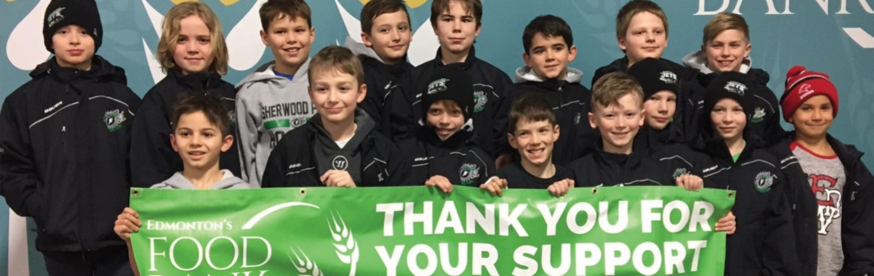 The SPMHA Atom A Jets teams volunteered their time at the Edmonton Food Bank to help sort food donations, just one of the many stories of how Alberta’s  hockey community gives back during the holiday season.